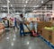 Costco staff wearing mask and refiling the pumpkin