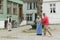 Costumed actors playing in Gamle Bergen Museum