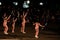 Costumed children do gymnastics move in Oregon holiday parade