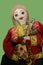 Costumed Doll Plays Mandolin