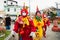 Costumed people are seen parading during the carnival