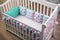 Cosy children `s tree white crib with multicolored soft cushions, white to the point with a simple, pigtail and cans. children`s