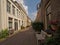 Cosy street with typical Dutch houses in a street in Utrecht, the NEtherlands