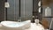 Cosy wooden peaceful bathroom in dark tones, big round bathtub, window, ceramic tiles floor, heated tower rail with towels,