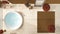 Cosy wooden peaceful bathroom in orange tones, big bathtub, ceramic tiles floor, carpet with sofa, round poufs, mirror, spa, hotel