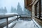 Cottage balcony covered with snow. Winter beauty