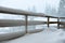 Cottage balcony covered with snow. Winter beauty