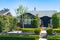 Cottage building on blue sky. Suburb architecture. Suburban housing