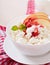 Cottage cheese with apple, berry syrup and sour cream