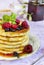 Cottage cheese fritters with honey and berries