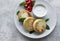 Cottage cheese pancakes, ricotta fritters on ceramic plate with  fresh strawberry