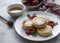 Cottage cheese pancakes, ricotta fritters on ceramic plate with  fresh strawberry