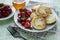 Cottage cheese pancakes, ricotta fritters on ceramic plate with  fresh strawberry