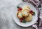 Cottage cheese pancakes, ricotta fritters on ceramic plate with  fresh strawberry