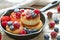 Cottage cheese pancakes, syrniki, curd fritters with fresh berries