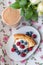 Cottage cheese pie with honey yogurt and berries