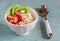 Cottage cheese with strawberries, kiwi, honey, cereals and seeds of flax - a healthy food, tasty and healthy Breakfast or snack