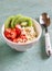 Cottage cheese with strawberries, kiwi, honey, cereals and seeds of flax - a healthy food, tasty and healthy Breakfast or snack.