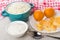 Cottage cheese, tangerines, bowl with sour cream and spoon