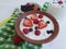 Cottage dairy cheese, yoghurt, strawberry,morning lunch blueberries healthy traditional eating a white wooden background