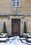 Cottage doorway with snow