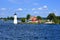 Cottage with lighthouse, Thousand Islands, New York state, USA