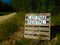 Cottage Rental Sign Along a Country Road