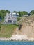 Cottage on sand dune cliff