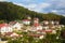 Cottage settlement on slope of low mountain