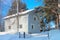 Cottage and trees in winter Rovaniemi