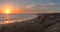 Cottages along Crystal Cove Beach at sunset