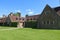 Cottages around a courtyard in the grounds of an old English country house