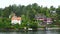 Cottages on the shore. Sweden. Amazing Swedish Wooden Log Cabin House On Rocky Island. Beautiful homes and vacation