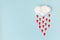Cotton ball Cloud and red Hearts rain on Blue Sky Background.Art Composition Valentines