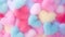 Cotton candy in the form of a colorful much of hearts, pastel background. Cute cotton candy in close-up, symbolizing romance and