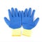 Cotton gloves with blue rubber on surface