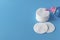 Cotton pads for skin care, for cleansing the face of cosmetics with tonic or micellar cleansing water. Cosmetic products.