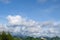 Cotton stratocumulus clouds with clear blue sky background and mountainous.