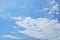 Cotton stratocumulus clouds with clear blue sky background. No focus.