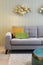 Couch detail in modern house with wall papper