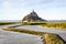 The Couesnon river flowing to the Mont Saint-Michel tidal island in Normandy, France