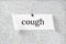 Cough word written on a piece of paper on notice board