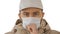 Coughing casual man in medical mask on white background.
