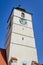 The Council Tower (Turnul Sfatului) towards clear blue sky in the old city center of Sibiu