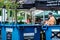 Council Worker Clearing Refuse Or Rubbish From Market Stall