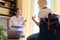 Counselor, social worker, psychologist advising a female teenager in the office