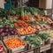 Counter of a street vegetable shop, fresh ripe fruits and vegetables in boxes, close-up, bright colors,