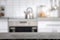 Countertop and blurred view of kitchen interior