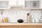 Countertop and blurred view of kitchen interior