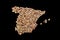 Countries winemakers - maps from wine corks. Map of Spain on black background.